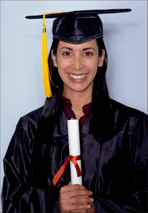 a woman scholar dressed in graduation gound and cap
